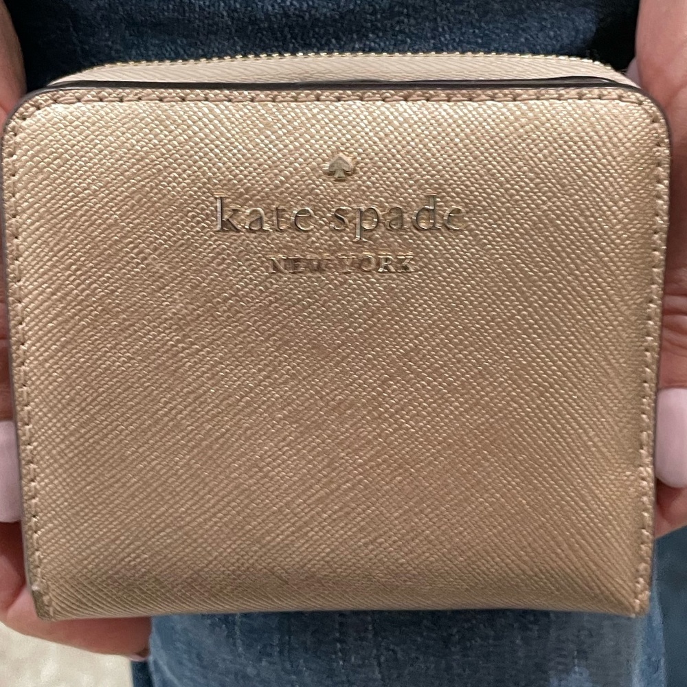 Kate Spade metallic rose gold Spencer small zip around wallet
